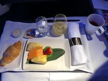 breakfast fruit  and croissant.  skipped yogurt/cereal course.