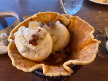 “Sundae” - ice cream and the candied nuts were good, but the waffle cone was awful.