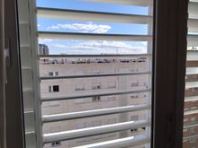 Outside blinds, open and closed. 