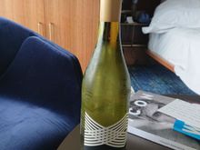 The amenity wine to go with the cheese. Yes,it was a full size bottle .