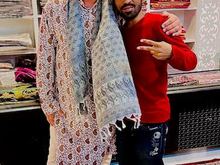My tailor Cookie and I in my new outfit