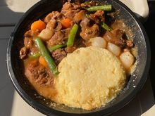 Red wine beef and vegetables served with polenta. Served approximately 12:30 pm, 3.5 hours into departure. 