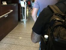 This is the line to the main Admirals Club, after I had already been waiting for a bit (the line was longer when I first arrived).  This is ridiculous.  At least there should be two lines: one for flight changes and one to just get in.