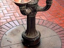 One of the many Benson Bubblers iconic bronze drinking fountains around the city