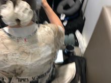 Not the best shot, I had to be sneaky. But notice the Bose headset plus the little black noise machine on the right. 