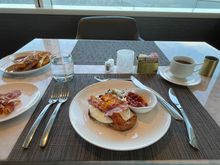 Breakfast in the lounge couple hours prior to flight.
