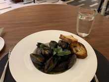 Steamed PEI Mussels with Thai green curry reduction - my favorite first course so far 