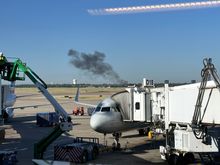 DFW Airport Fire Department conducting training at the fire training center on the southwest side of the airfield. 