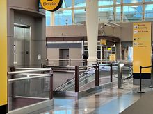 Take the west<->east walkway from Premier check-in opening on 11/10 and then the escalator or elevator down to TSA PreCheck at the North Checkpoint.