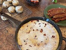 Mixed fruit clafoutis, cinnamon raisin biscuits, fruit, bacon for brunch. 