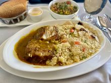Traditional Nile perch fish tajine 
roasted vegetable couscous