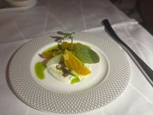 Amuse bouche of goat cheese and beets. 