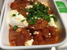 Eggplant Shakshuka - poached egg, feta, herbs. Please don't bother serving a poached egg if the yolk is going to be hard-cooked.  :-(