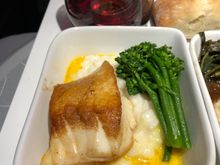 Pan-seared Seabass: parmesan risotto, broccolini, carrot-chardonnay sauce. Quite the dichotomy - the bass was top 10 in-the-air US carrier fish; the risotto and the sauce were awful.