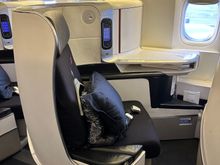 Business on the 77W, just as nice and I felt it was a bit wider in the footwell area. 