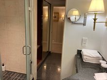 Seen froms shower room into the storage roo 