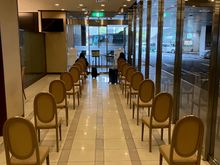 The bus lobby. Bus seats 28, there are 18 chairs here, so if all seats are taken and there's a huge line, assume you won't be getting on the next bus.