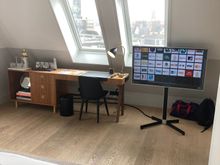 The TV can be turned to face the bedroom or sofa 
