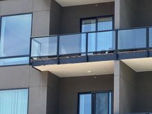 Empty balconies with some rough finish work. 