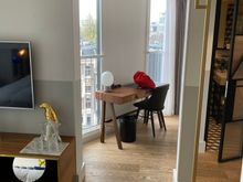 Look from the bed into the living area