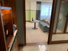 As you walk in you have the closet, mini bar, fridge on your left hand side. I loved their hangers - it was extremely nice and sturdy for winter coats. 
