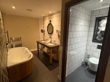 Direct off the entrance is the bathroom, there is no seperation or door, the loo does have its own door fortunate