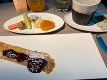 Cheese and apricot crepes with chocolate sauce