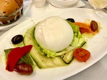 Handmade burrata
Basil and tomato pesto, courgette cream, olive confit.