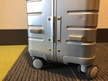 Side - not much wear here due to the plastic protectors. I think that one dent is from a railway baggage rack that it didnt fit gear into.