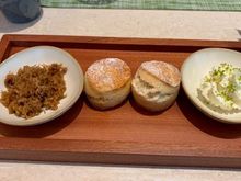 Afternoon tea (2-4pm) scones with coconut shavings and whipped cream