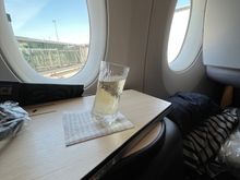 Welcome champagne.  Another glass as the drink after takeoff came with salted nuts. 