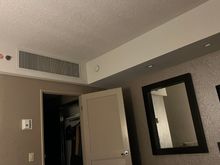 Popcorn ceiling and the largest vent I’ve seen in a Hyatt room.