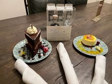 desserts, water and wine waiting in our room and a touching card from staff