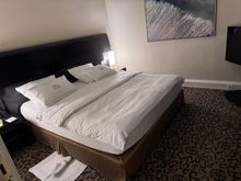 The rom did not have any USB ports near the bed, but did have open outlets. The bed was comfortable. Turndown service was performed. And the curtains made it really dark. 