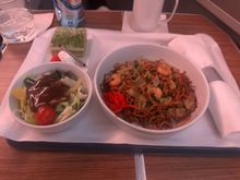 Pre-arrival meal served about 70 minutes out. Alternative was an omelette for “breakfast”, which my wife ordered and was better than the noddle plate. 