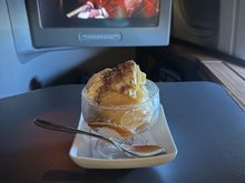 Only two brioches were catered for a full cabin. The FA suggested that I note when ordering that I’d like it in a future so it isn’t given away. She offered to get a chocolate tart from J, which was nice of her. 