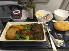 Quite literally the worst main I've ever had on BA. WTP touts itself as having CW mains... clearly not. Bizarre, overcooked chunks of beef rather than the (somewhat pitiful, but better) steak as per usual. Not to nitpick, but menu also said 'carrots,' not carrot - just all around quite poor, I thought. Bread not horrid but a bit overdone so crunchy, in a bad way, on one end.  