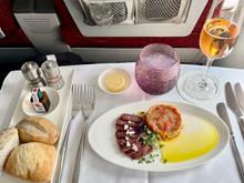 QR 228 SOF-DOH appetiser - lukanka (beef salami) and kyopolou (aubergine dip)