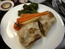 Exclusive International: Grilled Beef Burrito, Roasted Mixed Vegetables.