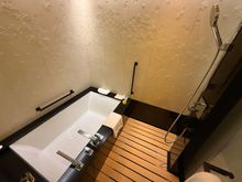 Stains and discoloration on the shower floor. 