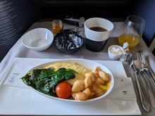Omelette was a bit rubbery side but acceptable. The potatoes however were downright atrocious. The worst I've had anywhere. They had a buttery flavor but they were drier than actual cardboard. This was the only food item I was served that I couldn't even eat half of (I do not like to waste food, especially on flights, so if I don't finish something it's pretty bad).