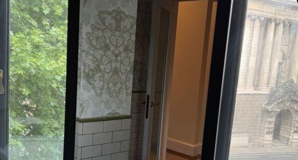 Old Bailey view behind bathroom mirror