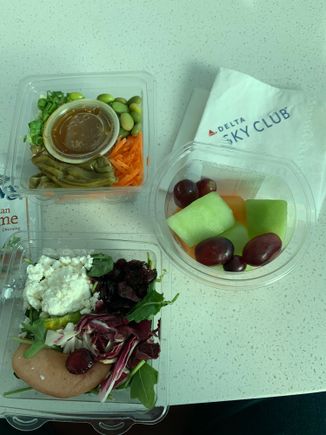 Salads, sandwiches, wraps, yogurt, fruit & cheese, and a separate sweets section (cookies, brownies)
