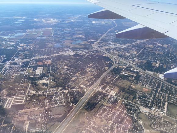 Overflying Dallas with the Cotton Bowl and State Fair in the distance
