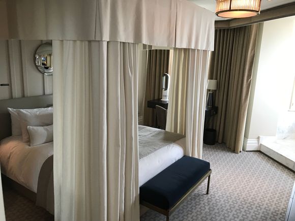 Canopied bed in bedroom