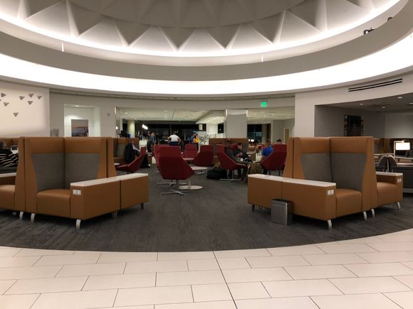 When you enter, this is the path to get to the rest of the AC. Why did they design it so that you have to walk through a seating area to get to the bar/food/other seating areas?