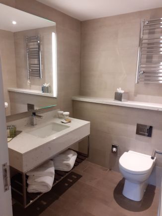 Bathroom ( shower to right of door and toilet)