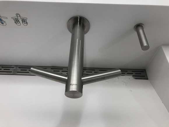 Modern faucet with built in dryer.