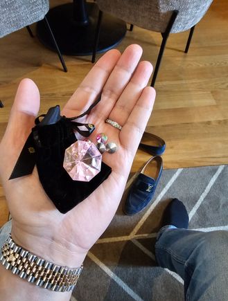 Large plastic diamond is for complimentary alcoholic beverages, and small sequences are for chocolates 