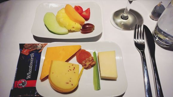 Fresh Fruit, Swiss Cheese, Cheddar and Herb Kwaito garnished with dried Prune and Walnut